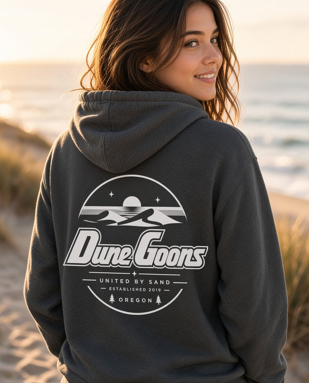 Dune Goons Oregon Coast hoodie on the beach