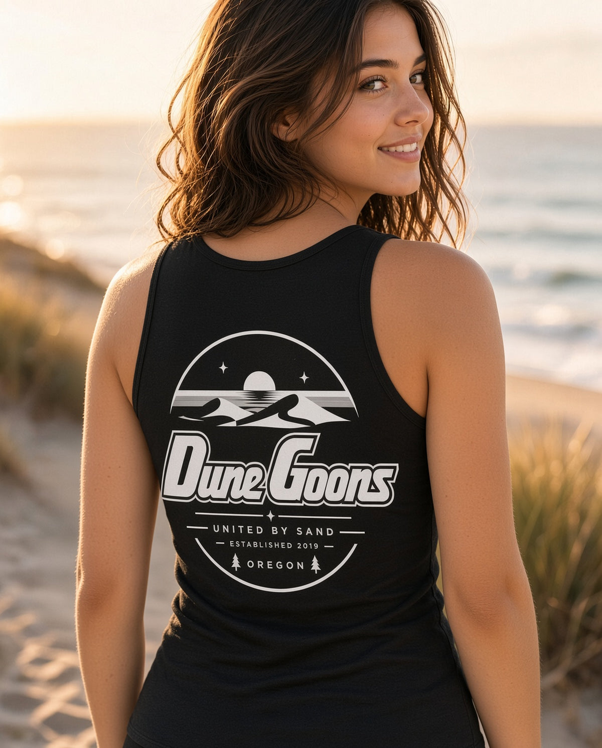 Dune Goons Oregon Coast Racerback Tank in Black, back view with the Oregon dunes logo